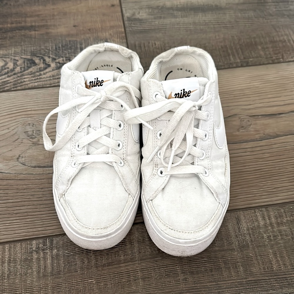 Nike slide in tennis